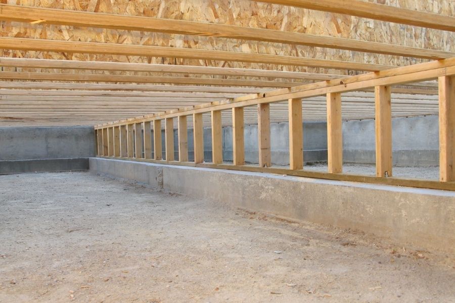 Construction Site Neat Clean Crawlspace, Floor Joists, and Pony Wall